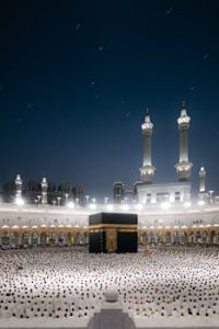 A breathtaking night view of pilgrims at the Kaaba in Masjid al-Haram, Makkah, Saudi Arabia.